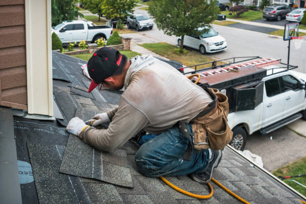 Professional Roofing technician working in La Fargeville, NY